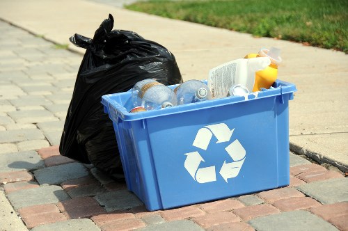 Workers sorting construction waste for recycling