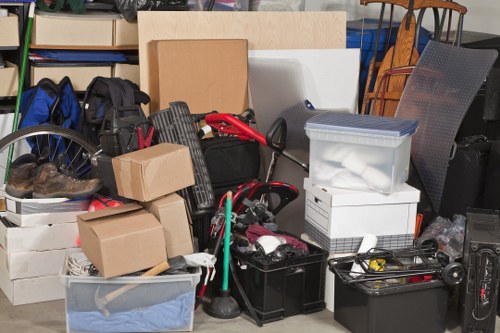 Professional movers carefully packing household items