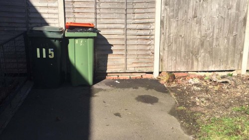Recycling bins with sorted construction materials